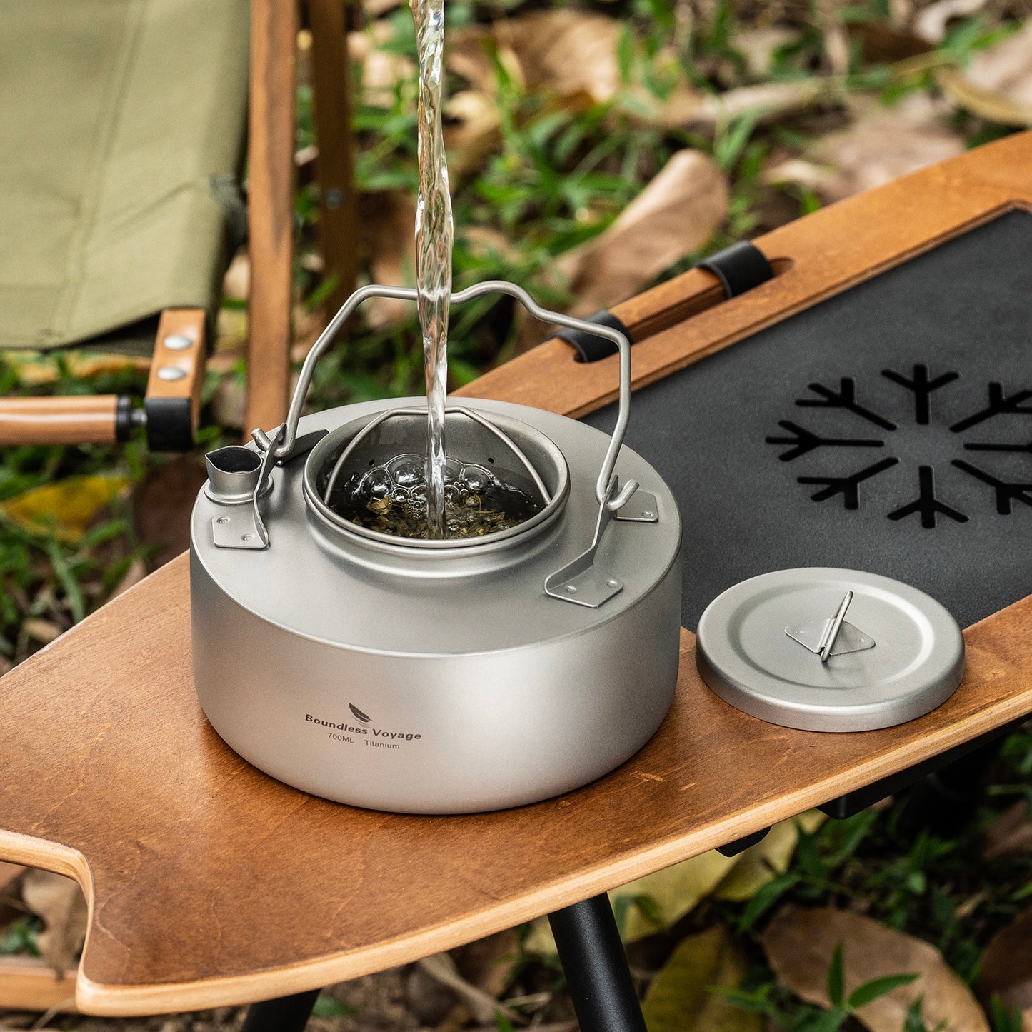 Boundless Voyage Titanium Kettle 700ml with Strainer – Ultralight Camping Pot with Folding Handle for Open Fire & Bushcraft
