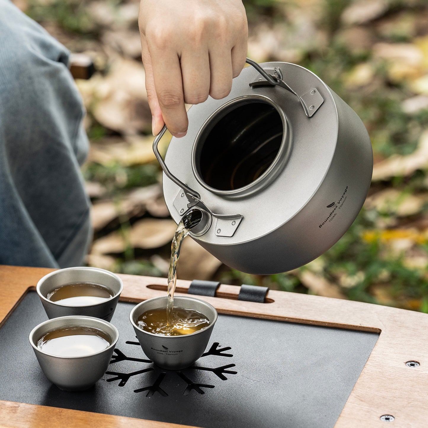 Boundless Voyage 700ml Titanium Kettle with Strainer – Ultralight Camping Pot with Folding Handle for Open Fire & Bushcraft