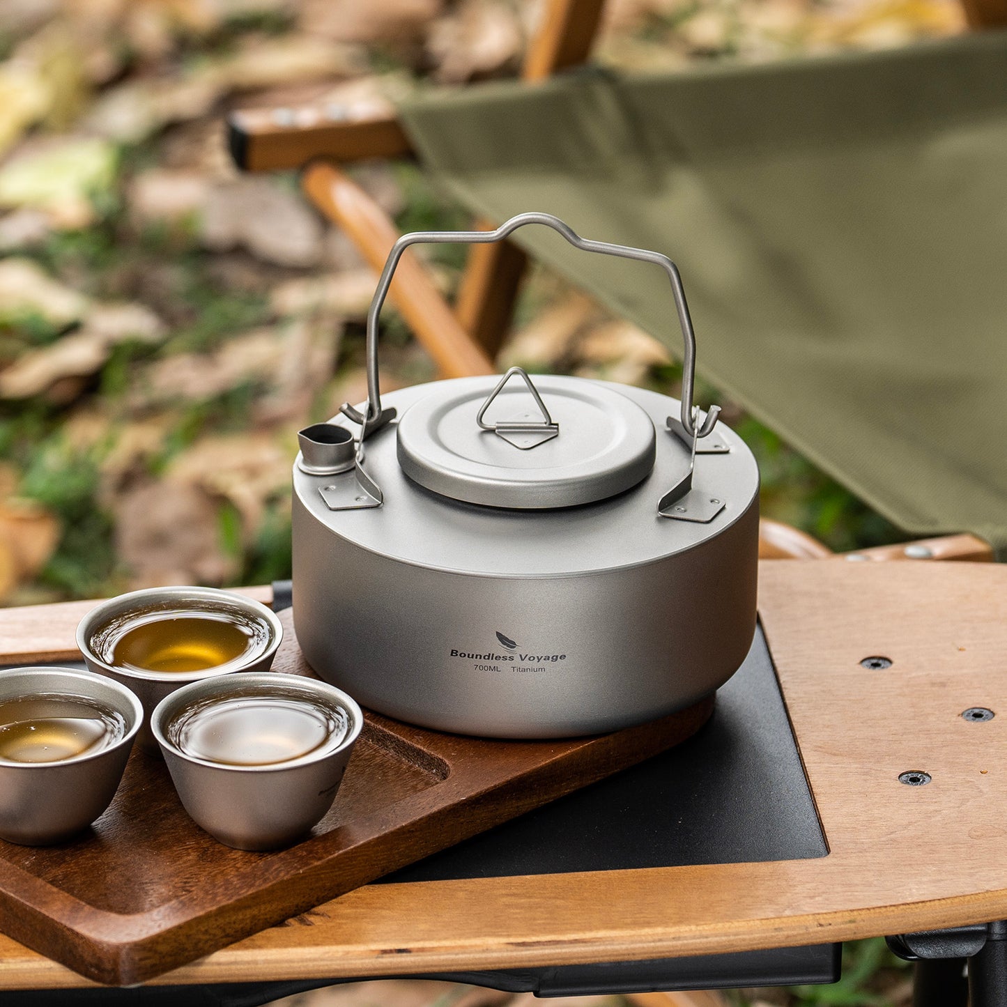 Boundless Voyage 700ml Titanium Camping Kettle – Ultralight Single-Layer Bushcraft Pot with Folding Handle for Open Fire Cooking